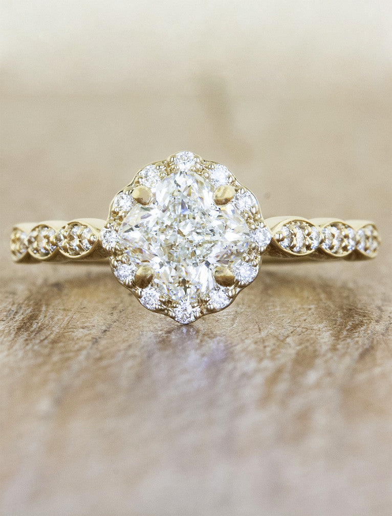 caption:Shown with 1.00ct cushion cut diamond in 14k yellow gold