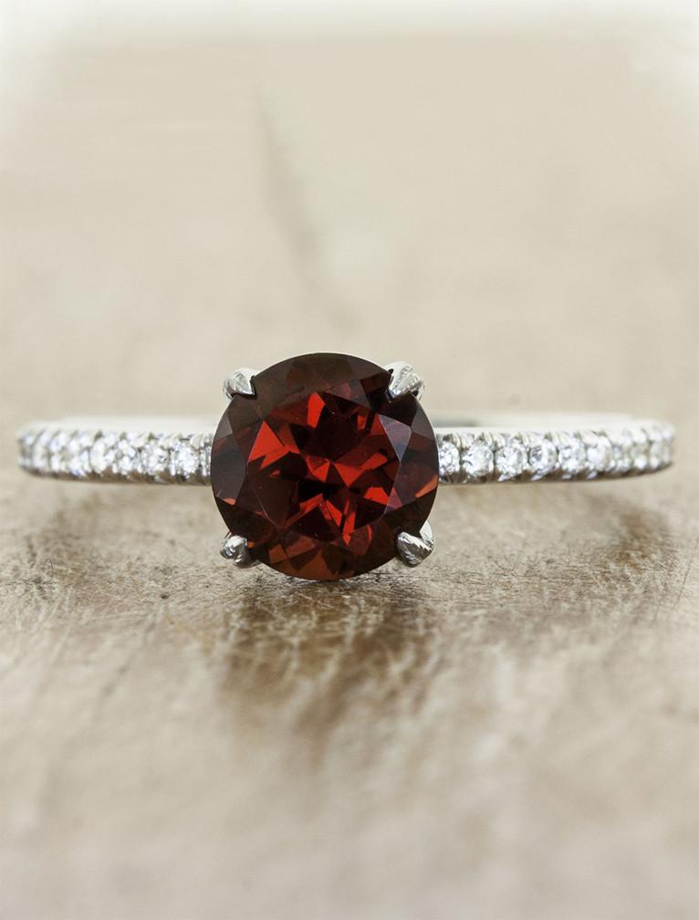 caption:Customized with 1.5ct round ruby & leaf prongs in platinum