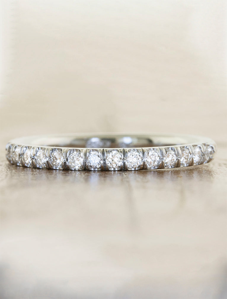 caption:Bella-Flat wedding band 1.6mm width with diamonds halfway around in platinum