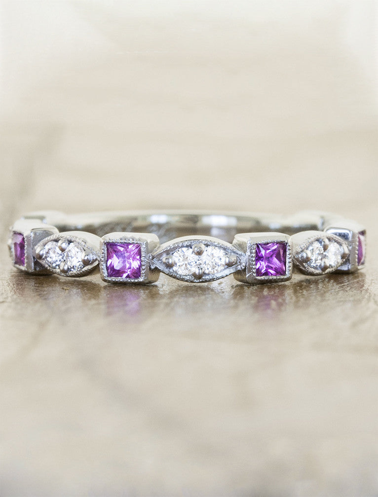 caption:Customized with pink diamonds in platinum