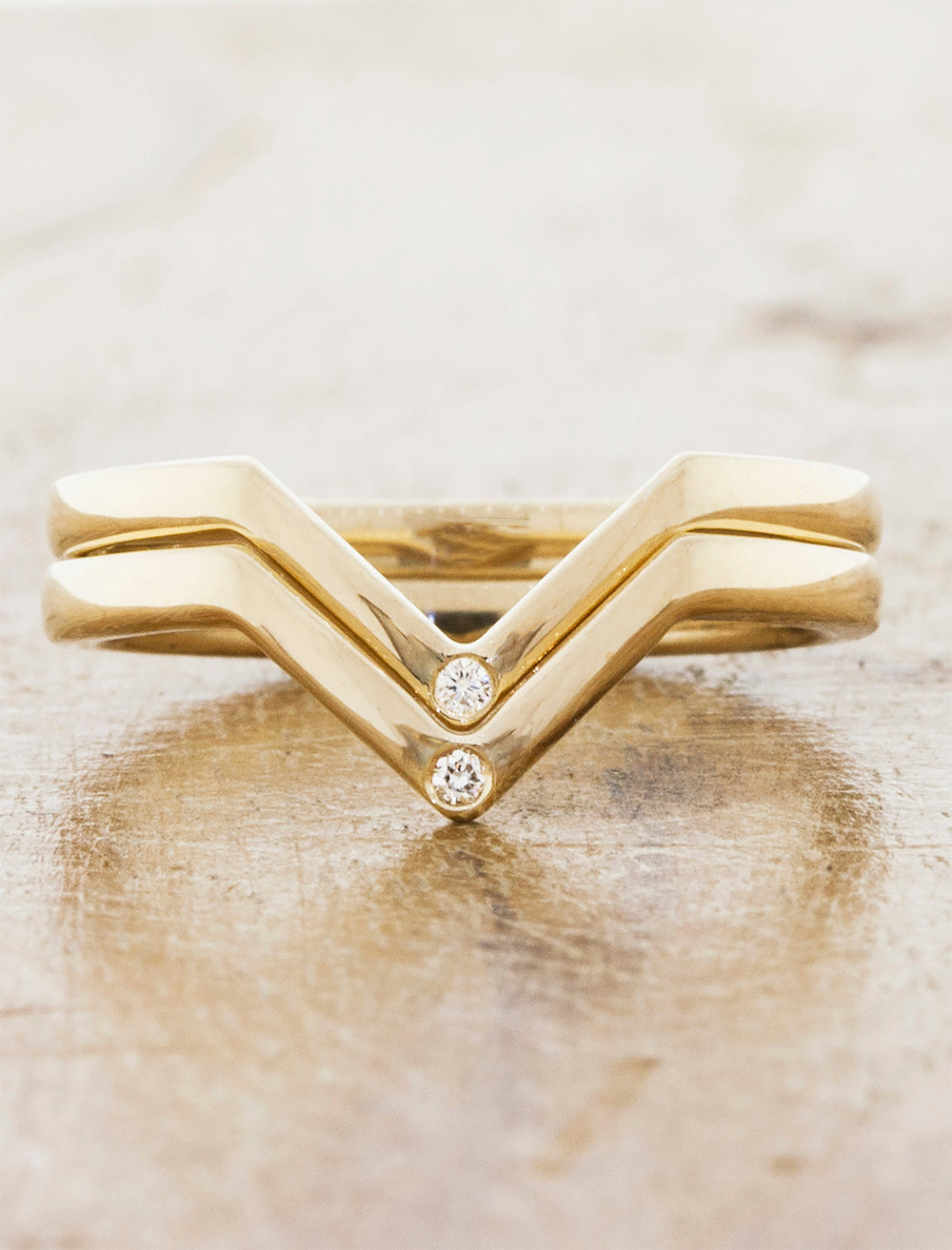 caption:Custom double Marie wedding band with diamond accents in yellow gold