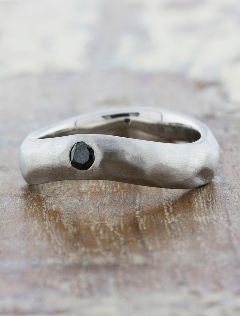 caption:Customized with black diamond in platinum