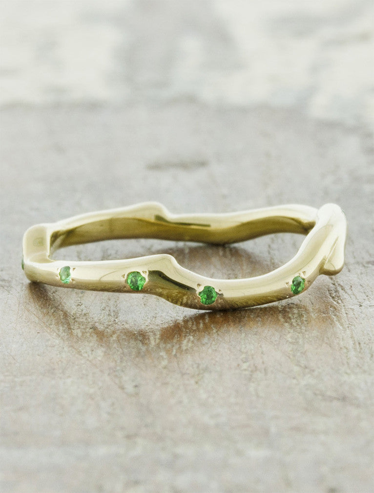 caption:Customizes with emerald stones in 14k yellow gold