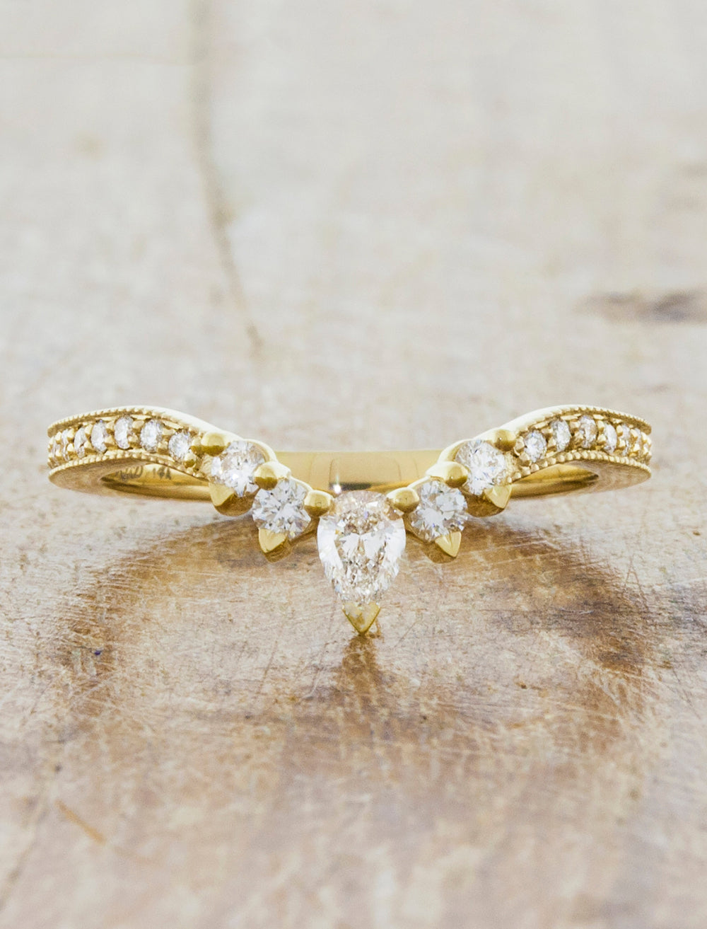 caption:Customized with pave diamonds in 14k yellow gold