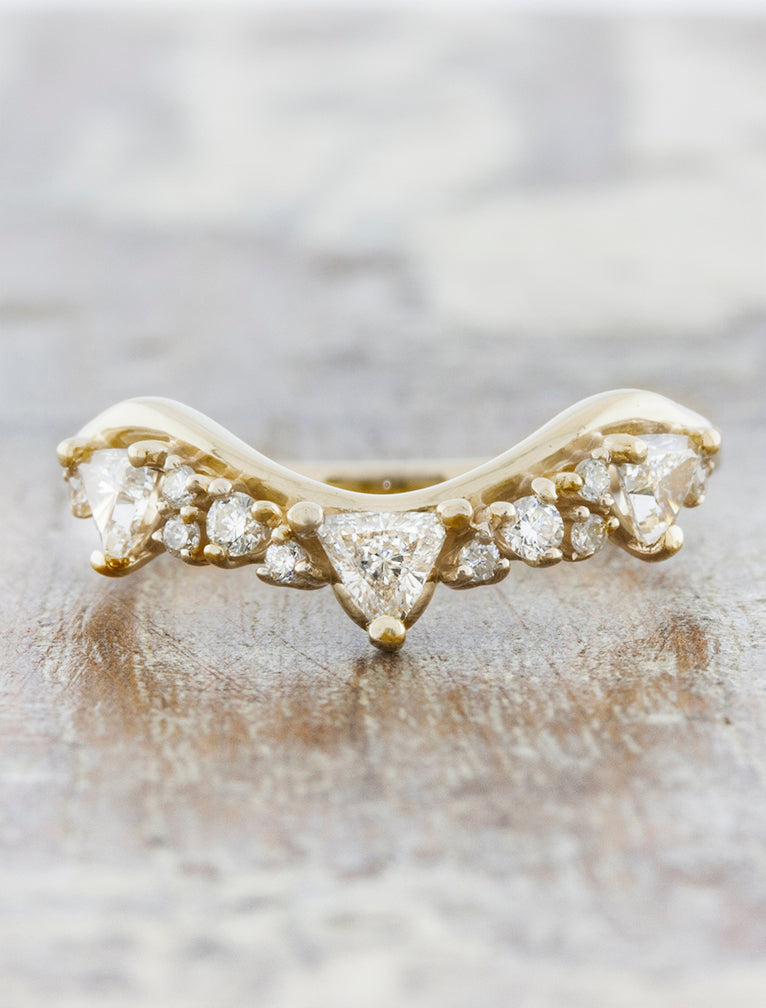 caption:Tempest wedding band in 14k yellow gold