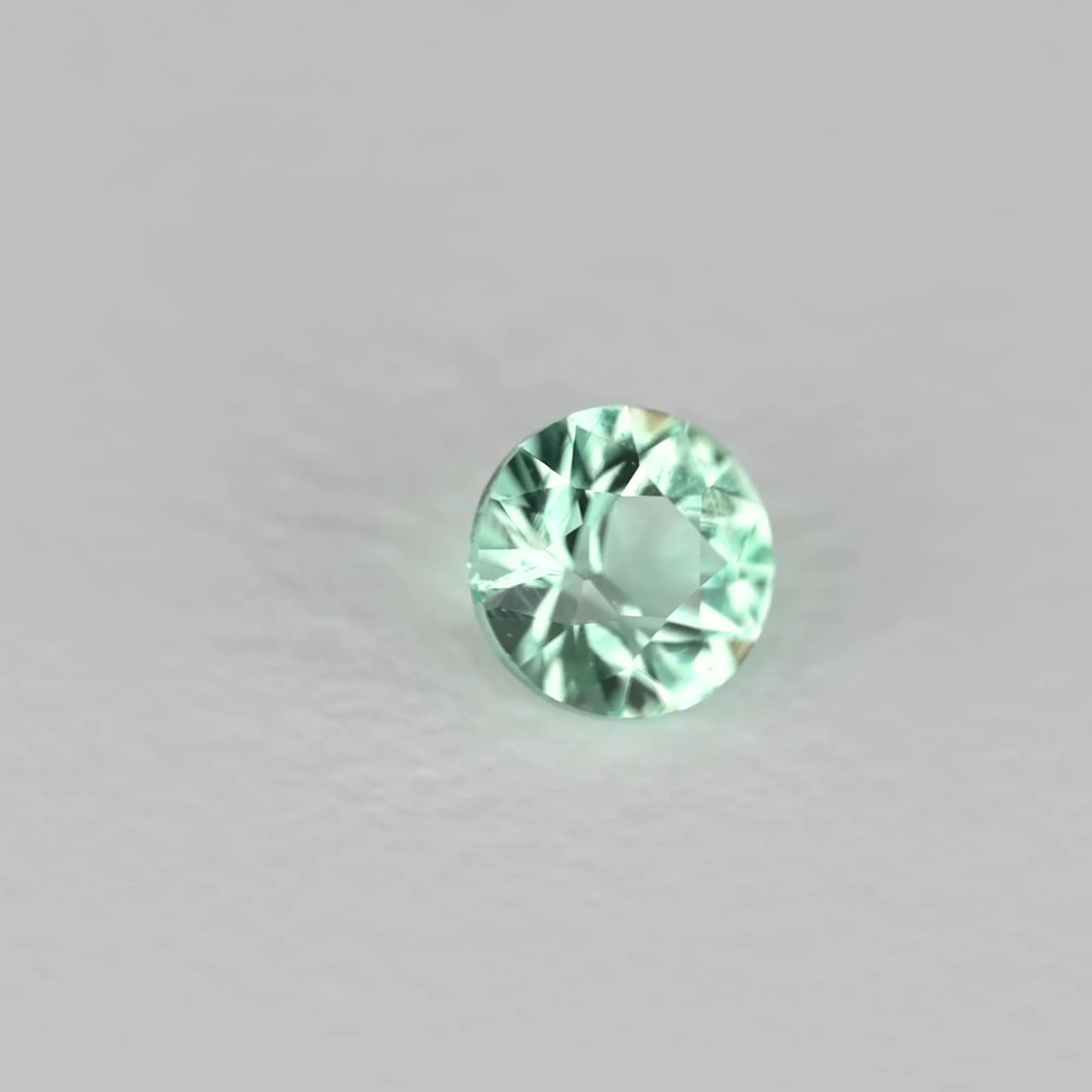 0.11ct Round Natural Emerald (Colour Green, Clarity Eye Clean, Cut Faceted)