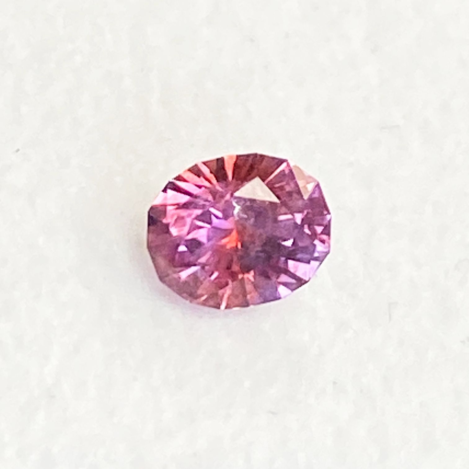 0.77ct Oval Natural Sapphire (Colour Multicolor, Clarity Eye Clean, Cut Faceted)