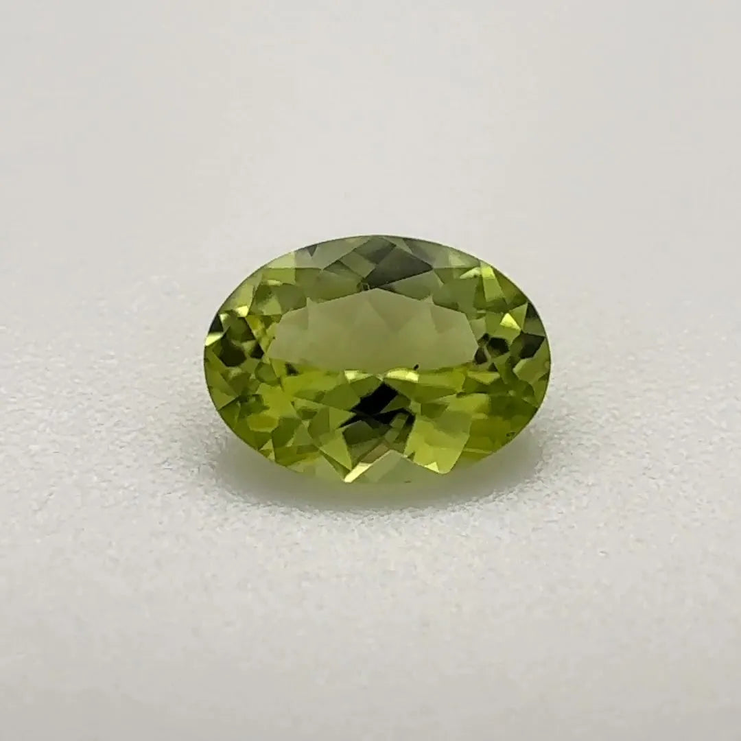 0.83ct Oval Natural Peridot (Colour Green, Clarity Slightly Included, Cut Faceted)