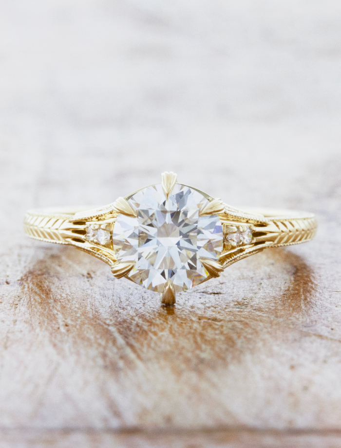 caption:Shown with 1.3ct round diamond in 14k yellow gold