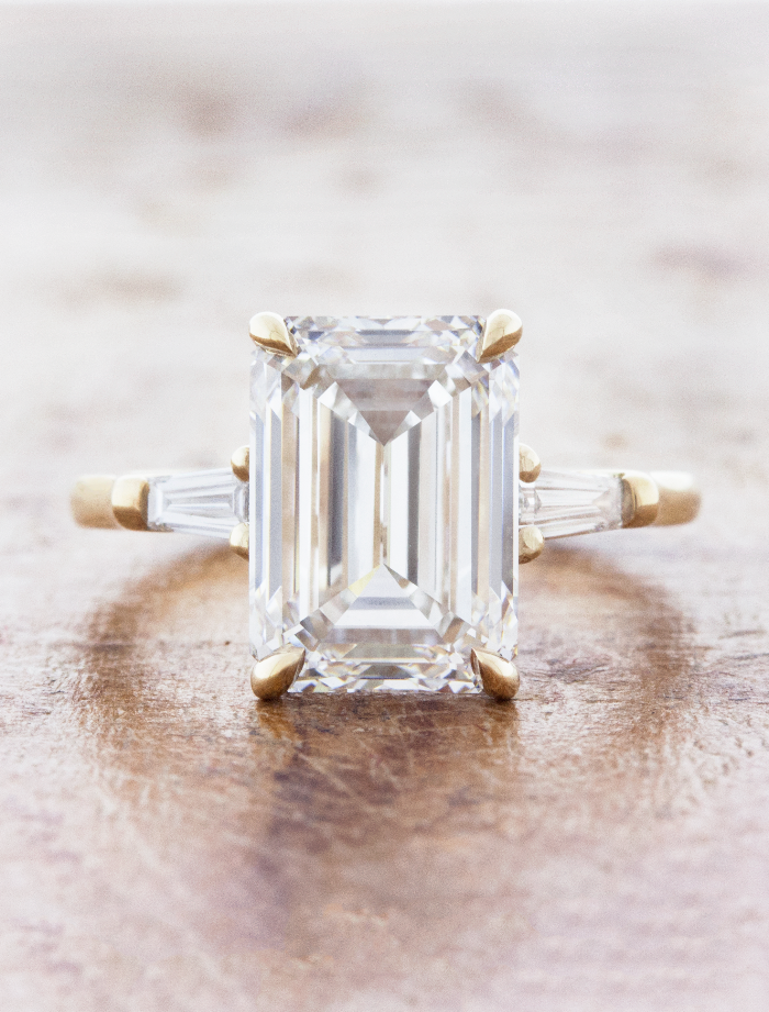 caption:Shown with 4.5ct emerald cut diamond in 14k yellow gold