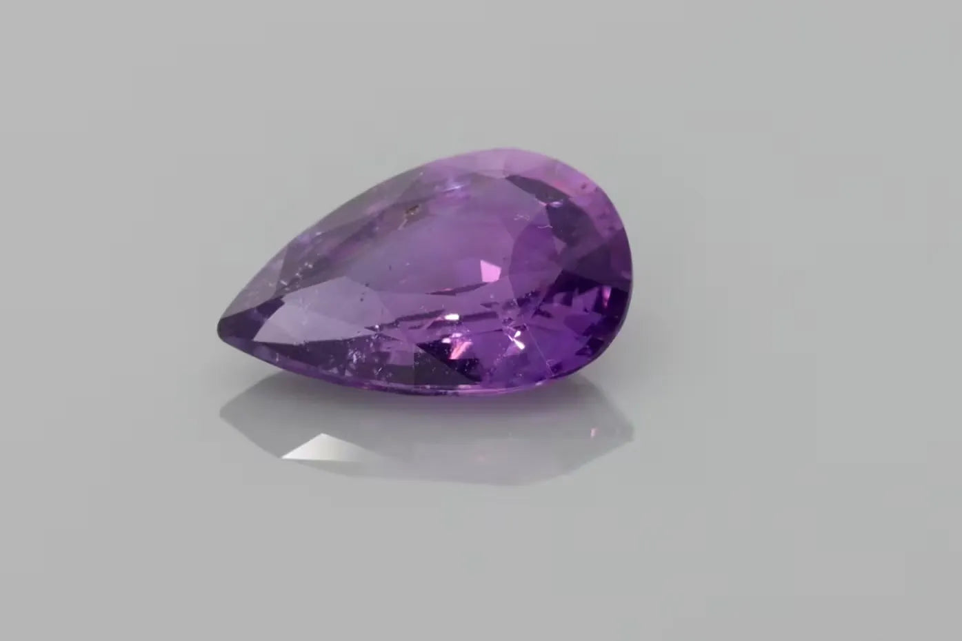 3.11ct Pear Natural Sapphire (Colour Purple, Clarity Slightly Included, Cut Faceted)