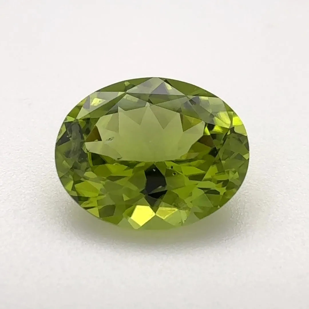 3.19ct Oval Natural Peridot (Colour Green, Clarity Slightly Included, Cut Faceted)