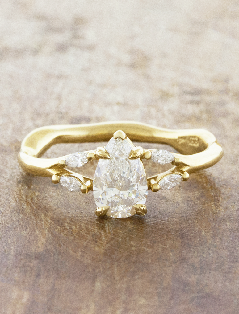 caption:Shown with 1ct pear in 14k yellow gold 
