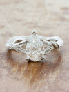 caption: Shown with 1.21ct pear diamond in 14k white gold