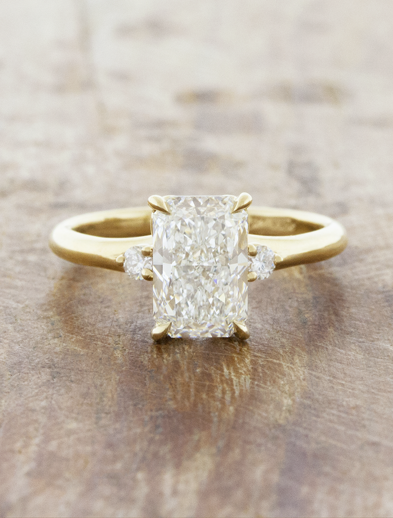 caption:Shown with 2ct radiant cut diamond in 14k yellow gold 