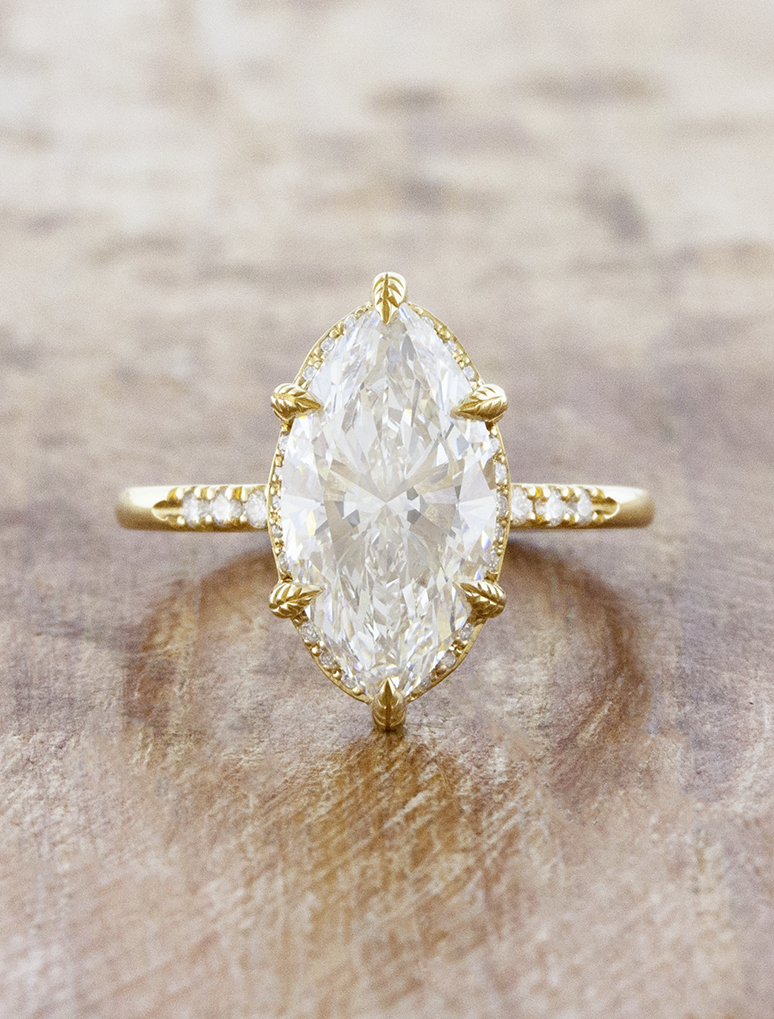 caption:Shown with 3ct marquise diamond in 14k yellow gold