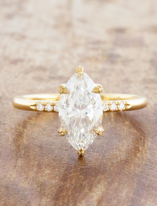 caption:Shown with 2ct marquise in 18k yellow gold