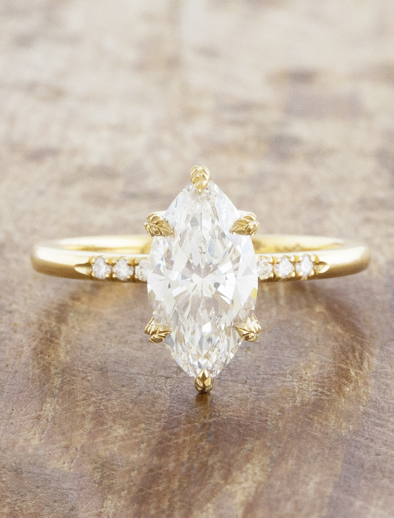 caption:Shown with 2ct marquise in 18k yellow gold