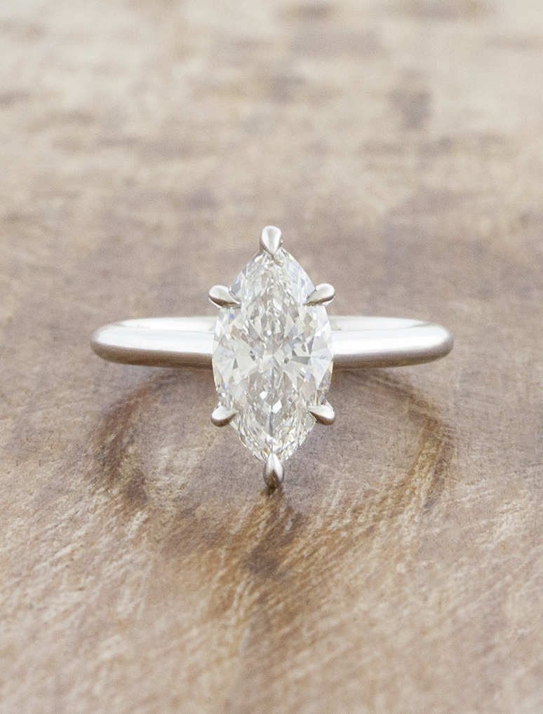 caption:Shown with 1.5ct marquise in 14k white gold
