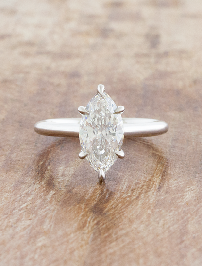 caption:Shown with 1.5ct marquise in 14k white gold
