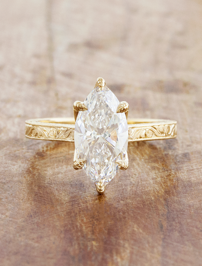 caption:Shown with 2.25ct marquise in 14k yellow gold