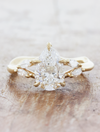 caption:Shown with 1.5ct pear diamond in 14k yellow gold