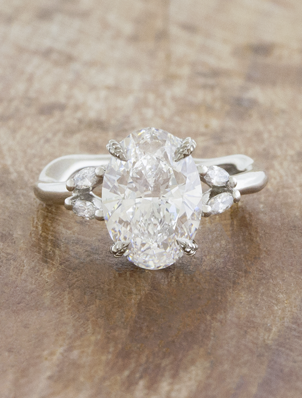 caption:Shown with 2.5ct oval in platinum