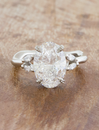caption:Shown with 2.5ct oval in platinum