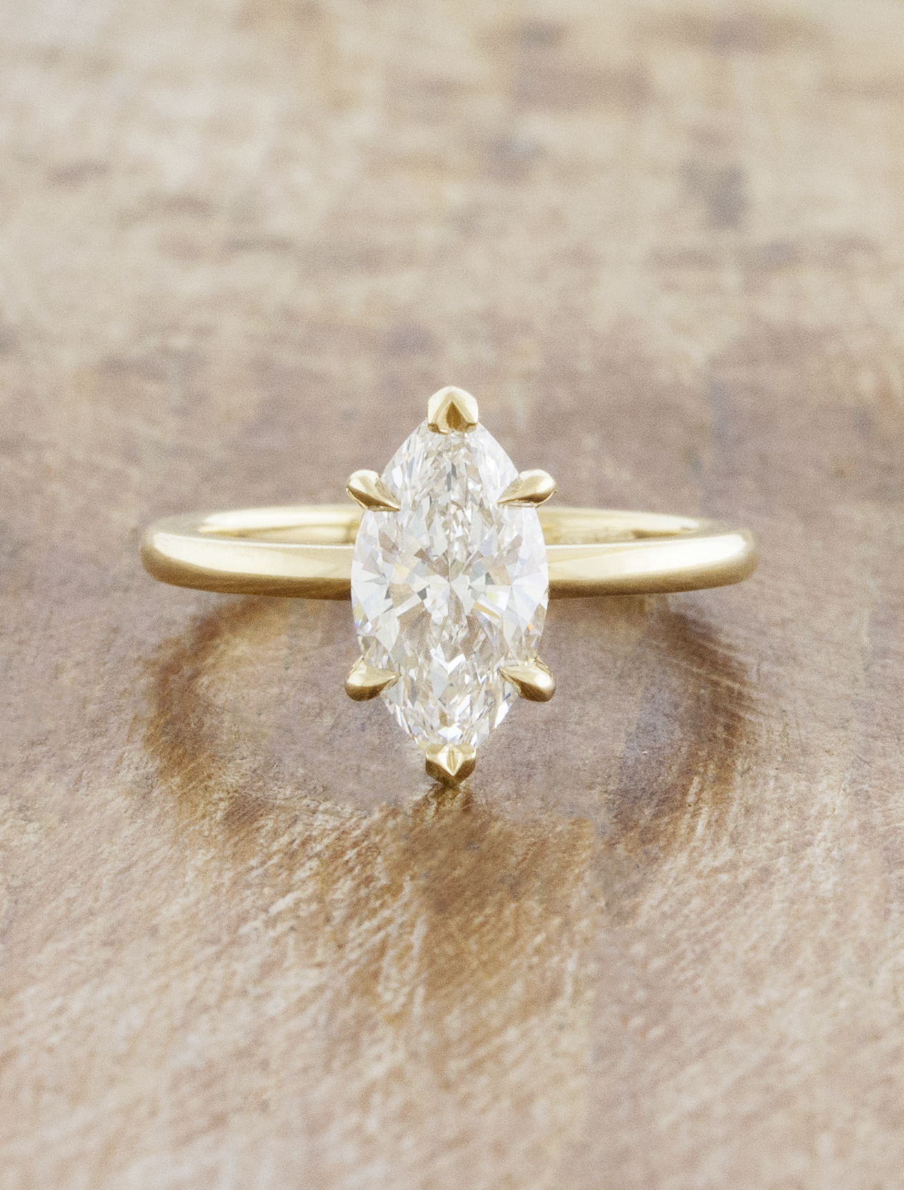 caption:Shown with 1.5ct marquise in 14k yellow gold