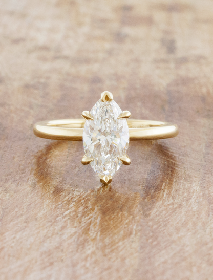 caption:Shown with 1.5ct marquise in 14k yellow gold