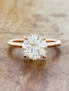 caption:Shown with 2ct round diamond in 14k rose gold