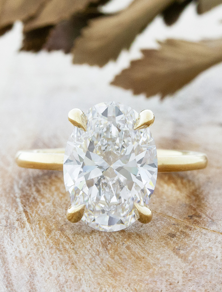 caption:Shown with 4ct oval diamond