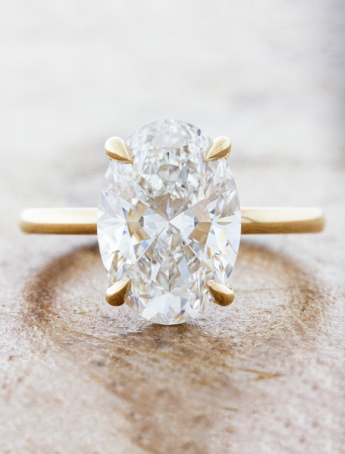caption:Shown with 4ct oval in 14k yellow gold