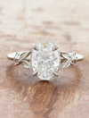 caption:Shown with 3ct oval in platinum