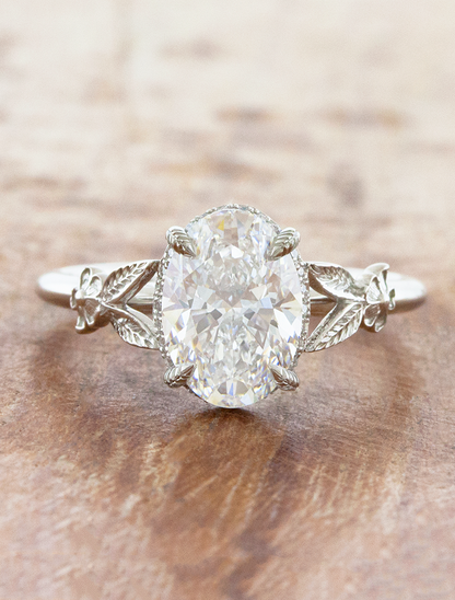 caption:Shown with 3ct oval in platinum