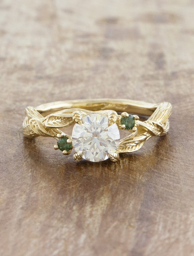 caption:Shown with 1ct round cut in 14k yellow gold 