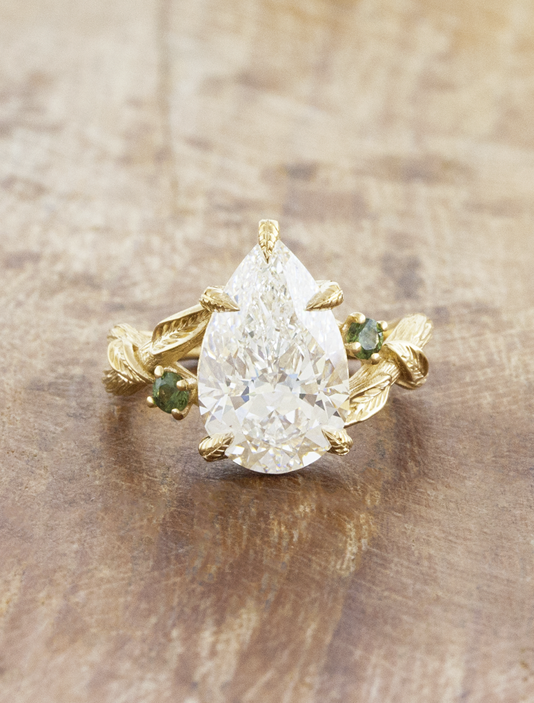 caption:Shown with 3.5ct pear in 14k yellow gold 