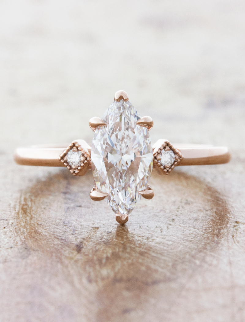 caption:Shown with 1.01ct marquise diamond in 14k rose gold