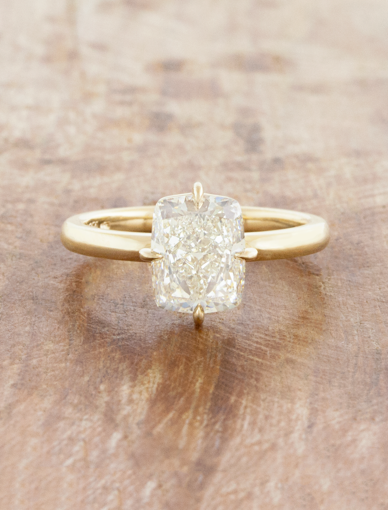 caption:Shown with 3ct cushion cut in 14k yellow gold 