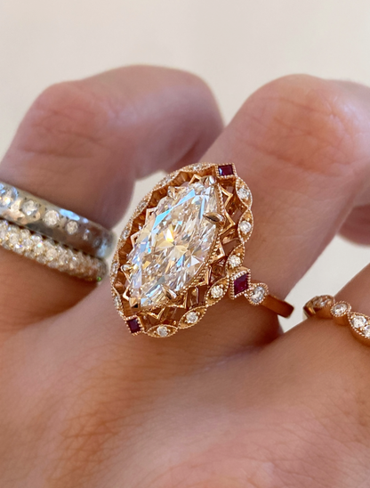 caption:Shown with 4ct marquise in 14k rose gold