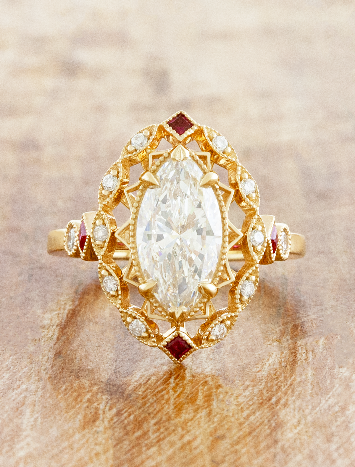 caption:Shown with 1.7ct marquise in 14k yellow gold