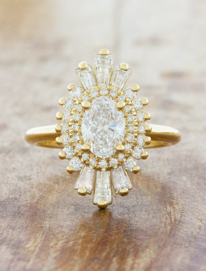 caption:Shown with 0.77ct oval diamond in 14k yellow gold