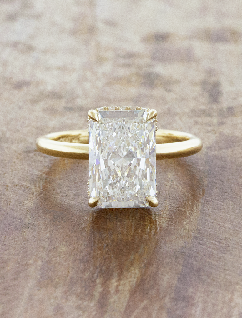 caption:Shown with 3.5ct radiant cut in 14k yellow gold