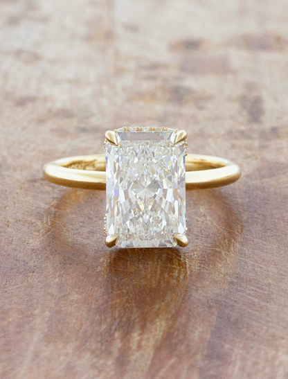 caption:Shown with 3.5ct radiant cut in 14k yellow gold