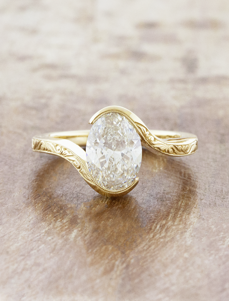 caption:Shown with a 1.7ct oval in 14k yellow gold