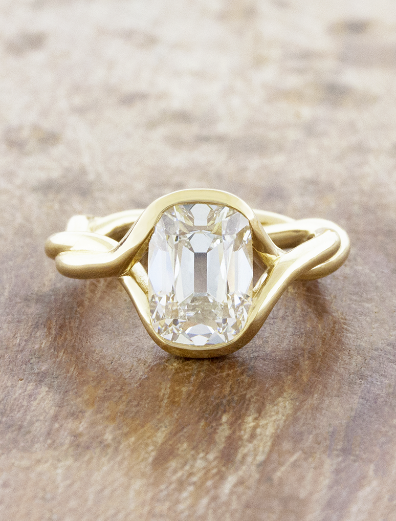 caption:Shown with a 3ct Old Mine in 14k yellow gold 