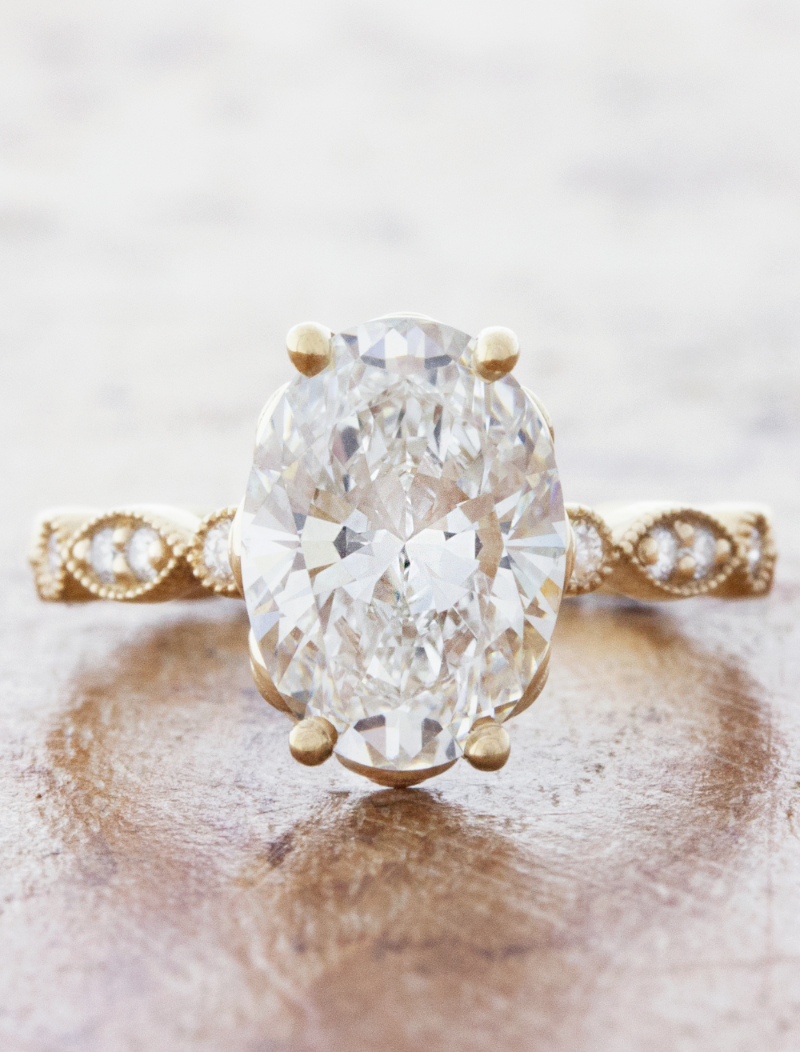 caption:Shown with 2.90ct oval diamond in 14k yellow gold