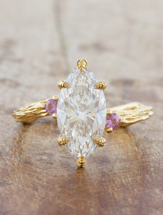 caption:Shown with 2ct marquise in 18k yellow gold 