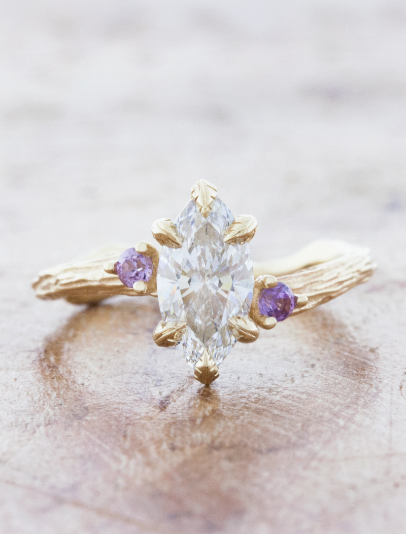 caption:Shown with 1ct marquise diamond in 14k yellow gold, custom lavender sapphires