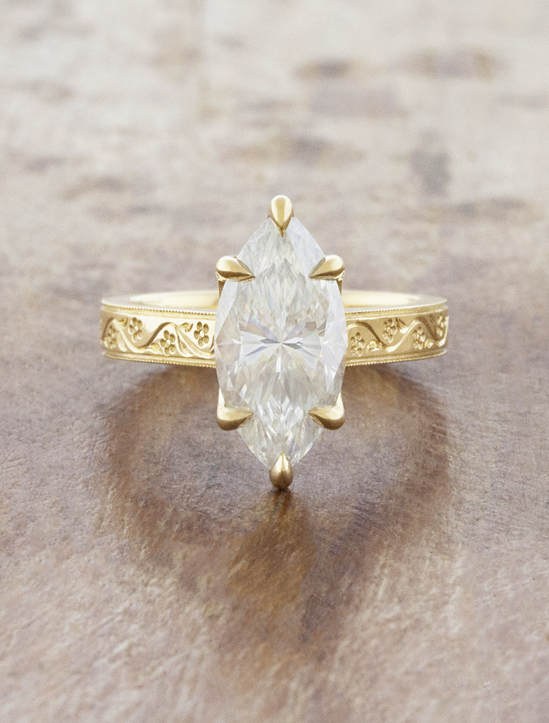 caption:Shown with 2.7ct marquise in 18k yellow gold 